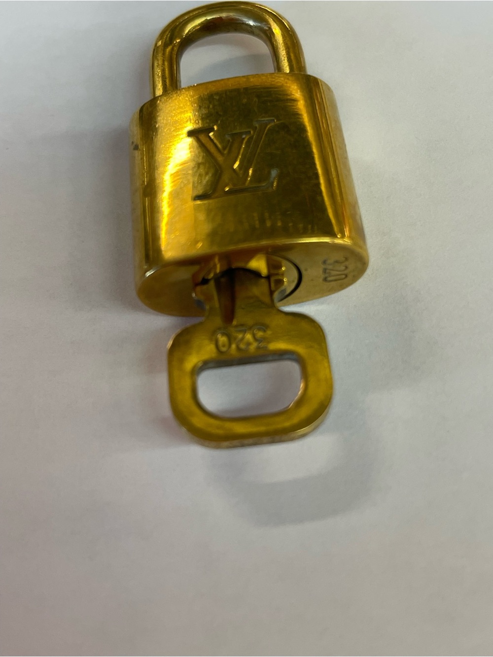 Louis Vuitton brass padlock and matching key engraved with the number 320 - Picture 2 of 4